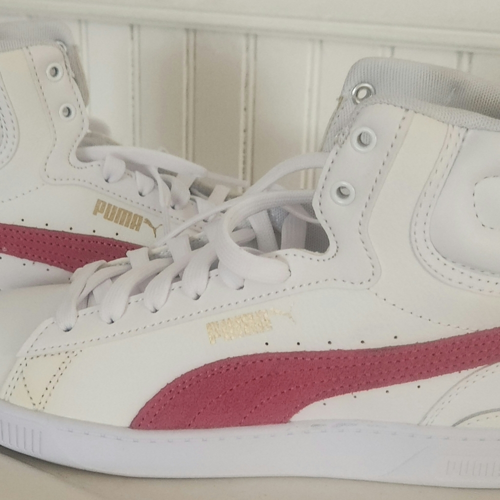 High top Puma tennis shoes